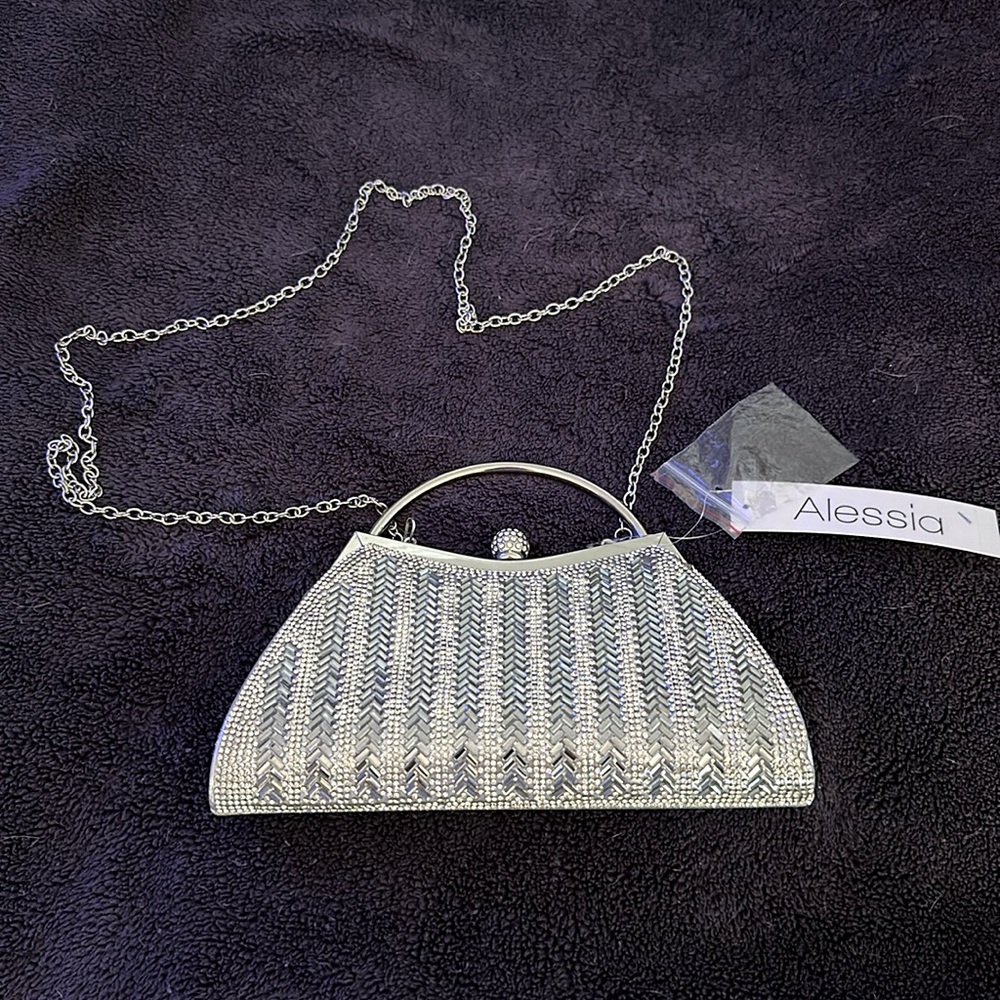 Alessia Bianchi Silver Kiss lock clutch. Can be used w/wo chain. Never used.